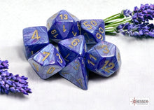 Chessex - 27497 Lustrous Purple Dice w/ Gold numbers